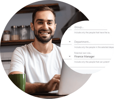 Employee at a laptop beside filters selecting Finance Manager as a potential next role