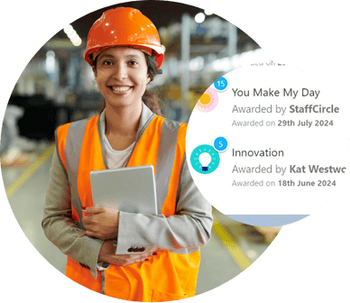 Warehouse worker beside awards received for You Make My Day and Innovation